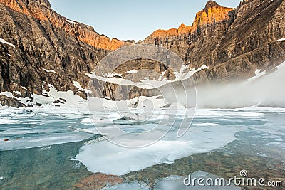 Fog over Iceberg Lake, Glacier National Park Stock Photo
