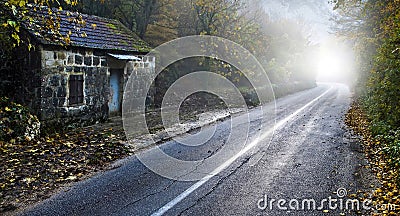 Fog at ruin house and road Stock Photo