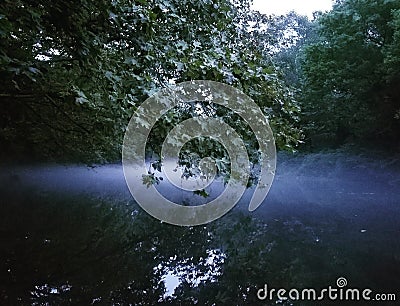 Fog Settling Over River Stock Photo