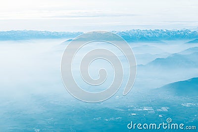 Foggy aerial scenery of mountains Stock Photo