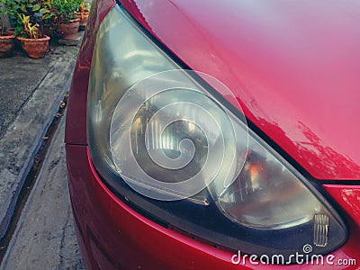 Foggy and cloudy car headlight lenses Stock Photo