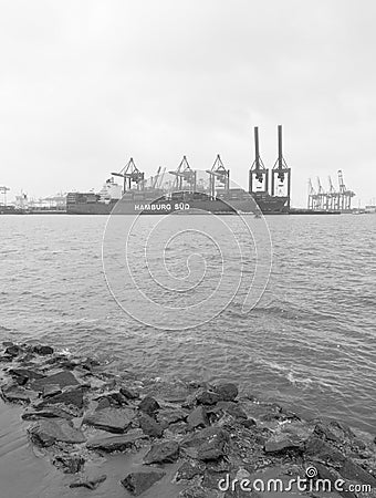 Foggy day in Hamburg. Cargo traffic in Hamburg. It`s the central Editorial Stock Photo