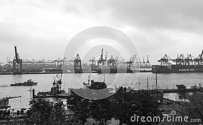 Foggy day in Hamburg. Cargo traffic in Hamburg. It`s the central Editorial Stock Photo