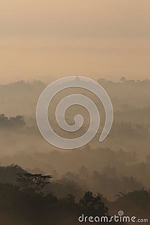 Foggy Early Morning Borobudur Famous Temple Silhoulette Stock Photo