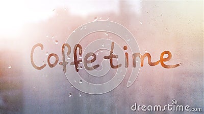 Foggy glass on window with written finger words coffe time on muddy blue glass wet orange window in city on sunset Stock Photo