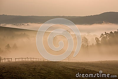 Foggy hills in autumn dawn, Czech Stock Photo