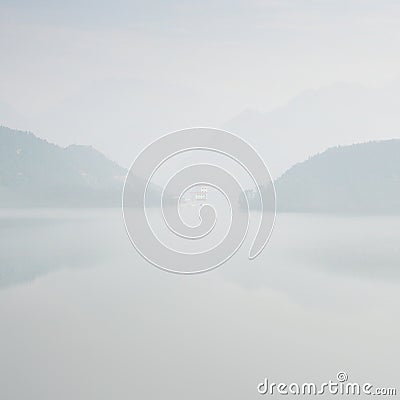 Foggy landscape with silhouettes of mountains in South China Stock Photo