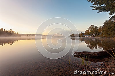 Foggy morning in lake of Algonquin Provincial Park, Ontario, Canada Stock Photo
