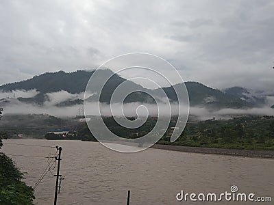 Foggy Morning in Srinagar (Garhwal) Alaknanda River Tributory River Ganga Stock Photo