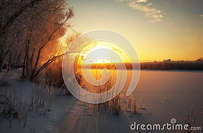 Foggy morning sunrise. Colorful evening, bright sunshine over a river or lake. Stock Photo