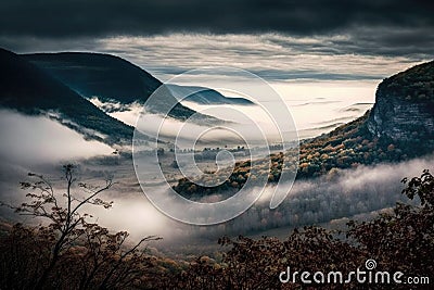 foggy mountaintop, with view of misty valley below Stock Photo