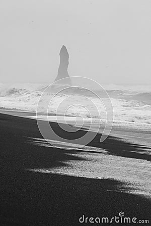 Foggy Reynisfjara beach monochrome landscape photo Stock Photo