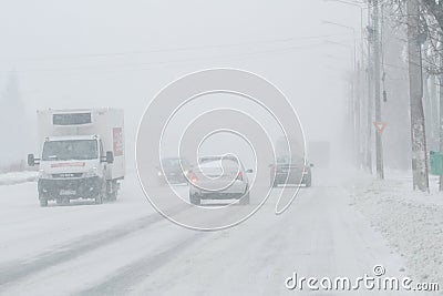 Foggy, snowed road with low visbility Editorial Stock Photo