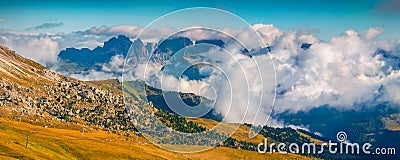 Foggy sunny panorama of the Val Gardena valley Stock Photo