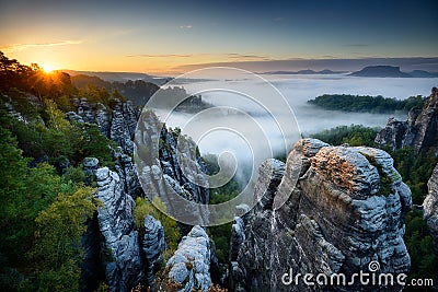 Foggy sunrise at Bastei, Saxon Switzerland, Germany Stock Photo