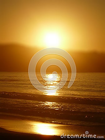 Foggy sunset Stock Photo