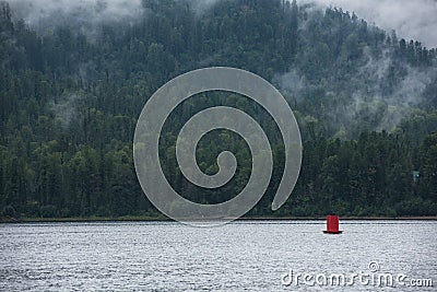 Foggy Teletskoye lake in Altai mountains Stock Photo