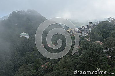 Mussoorie, Uttarakhand, India. The village in fog Stock Photo