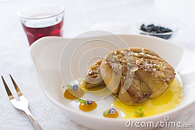Foie Gras with Apple Sauce on White Plate Stock Photo