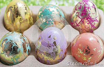 Foiled and Colorful Easter Eggs in Pink, Aqua, Yellow, Orange an Stock Photo