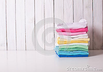 Folded baby clothes Stock Photo