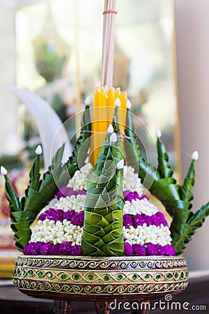 Folded banana leaves decorating with flower, candle and joss sti Stock Photo
