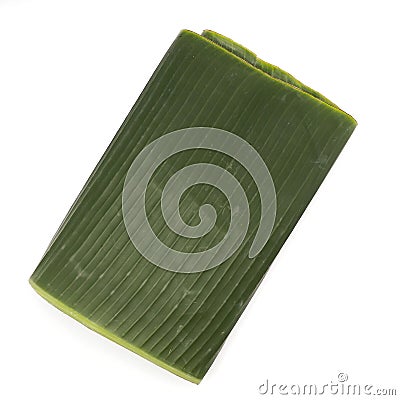 Folded banana leaves for food wrap on white background. Stock Photo