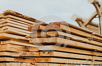 Folded boards and logs on construction site Stock Photo