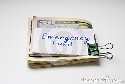 Folded Fifty Dollar Banknote And Emergency Fund Text On Paper Stock Photo