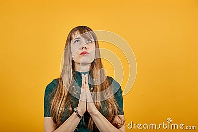 Folded hands together praying asking God help ask implore wish upwards Jesus Stock Photo