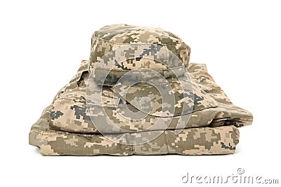 Folded military uniform and cap isolated on background Stock Photo