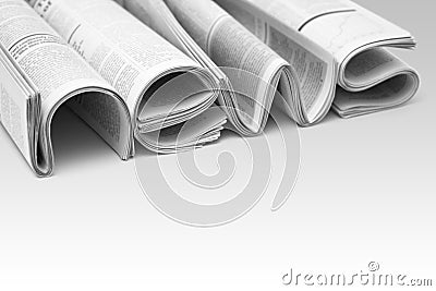 Folded modern newspapers. Concept of business news and print media Stock Photo