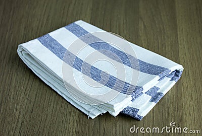 Folded napkin on table Stock Photo