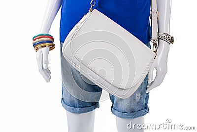 Folded shorts with leather handbag. Stock Photo