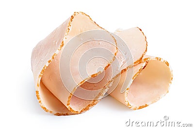 A folded single slice of chicken ham isolated on white Stock Photo