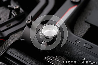 Camcorder tripod on black background, design element Stock Photo