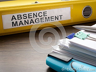 Folder about absence management and papers. Stock Photo