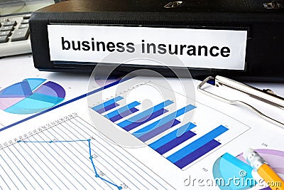 Folder with the label business insurance Stock Photo