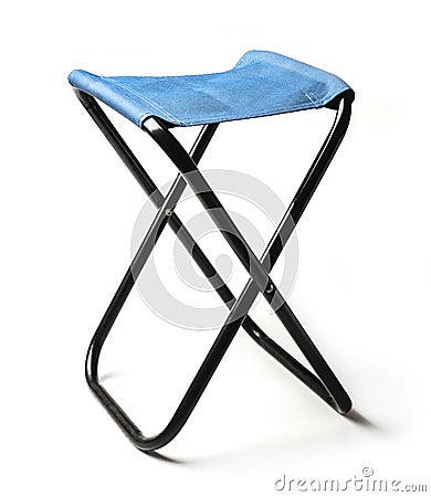 Folding camping stool Stock Photo