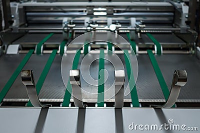 Folding Machine Green Belts Feed Wheels Metal Industrial Appliance Paper Stock Photo