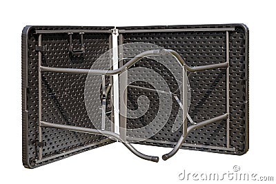 Folding table isolated. Close-up of a portable folding outdoor plastic table in rattan look for camping, garden, party or terrace Stock Photo
