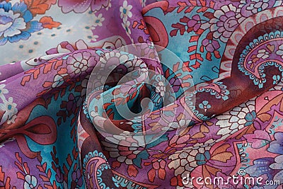Folds of colored fabric with a pattern. Stock Photo