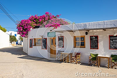 Traditional Greek restaurant in the city of Chora on Folegandros island. Cyclades, Greec Editorial Stock Photo