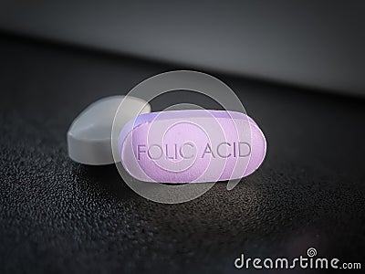 Folic acid folate supplement pill Stock Photo