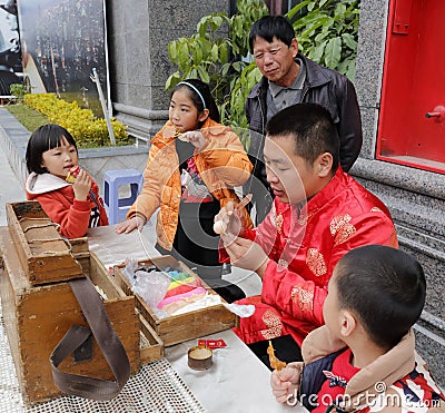 The folk artist make traditional chinese dough doll Editorial Stock Photo