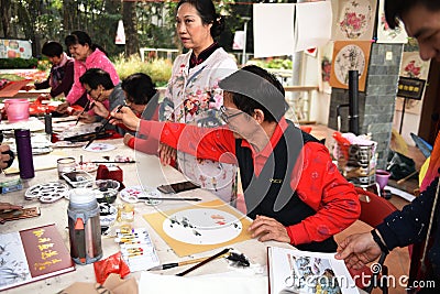 The folk craftsman who is making Chinese fans Editorial Stock Photo