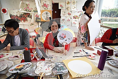 The folk craftsman who is making Chinese fans Editorial Stock Photo