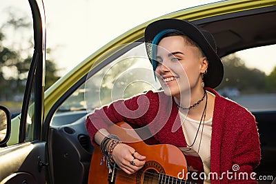 Folk musician girl singing Stock Photo