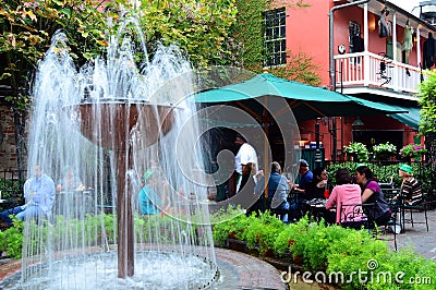 Outdoor dining at a courtyard in New Orleans Editorial Stock Photo