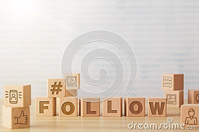 Follow concept with toy cubes Stock Photo